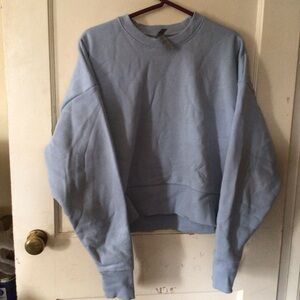 Next Level Apparel Light Blue Cropped Sweatshirt
